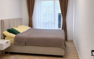 Apartament 3 camere  Curte proprie  Complet mobilat și utilat