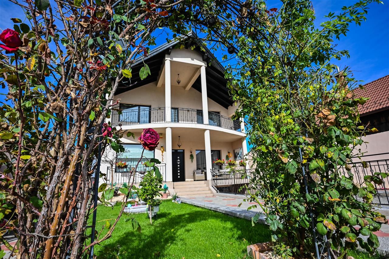 Somptuozitate in stil modern, 2 garaje, 3 terase, totul pe 1.000 mp teren - Poză 1