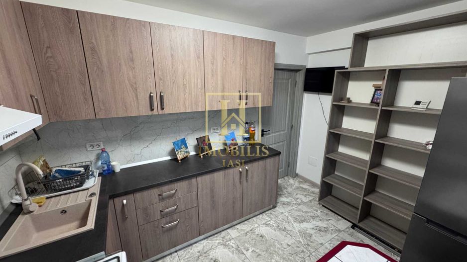 Apartament 1 camera Dec 38 mp Bucium 66500 euro. - Poză 1