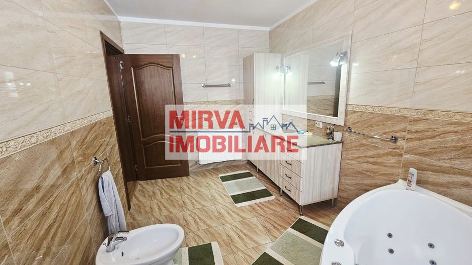 Vilă spațioasă Strejnicu S+P+1E+M, 8 camere, garaj, teren 595 mp - Poză 73