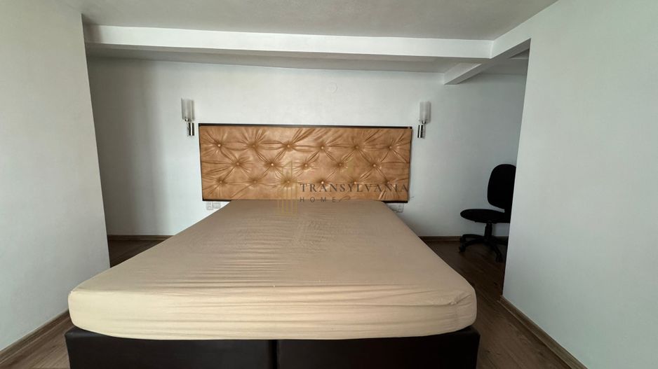 Apartament pe 2 niveluri, intabulat,  Zona Stefan cel mare - Poză 2
