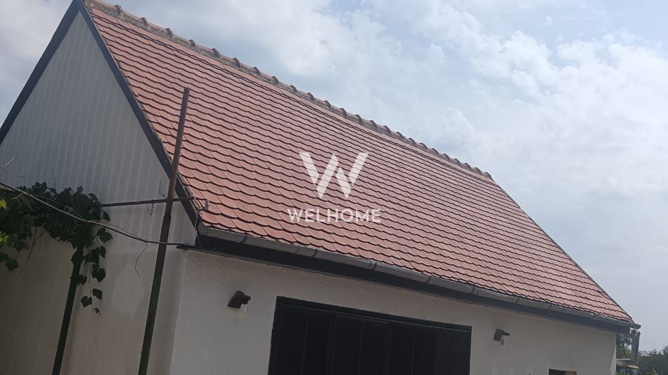 Casă individuală cu 2 apartamente separate, teren 650 mp, garaj și terasă - Poză 11