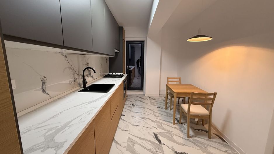 Apartament cu 2 camere, parcare subterana și 2 balcoane - Poză 2