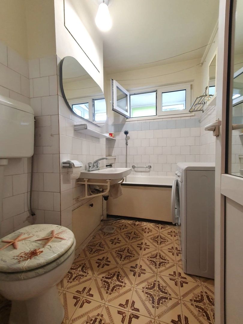 Apartament luminos cu vedere spre biserică, într-un cartier verde și liniștit. - Poză 16
