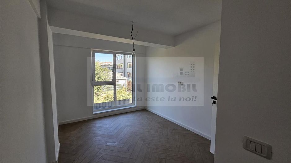 Apartament exclusivist dispus P+1E + curte 70mp - Poză 10
