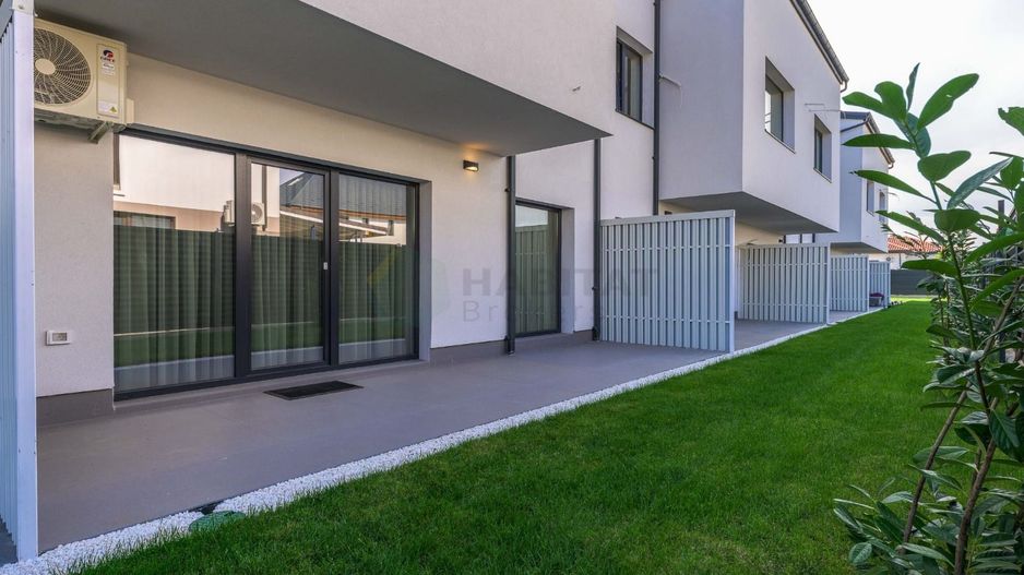 Apartament cu gradina proprie, doua locuri de parcare, gata de mutat - Poză 1