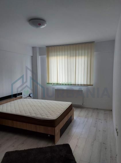 închiriez apartament cu o camera - Poză 7