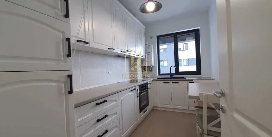 Apartament 2 camere,Dec.,54.6 mp Pacurari 133000 euro + loc de parcare - Poză 1