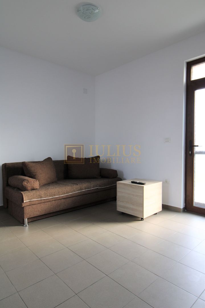 2 dormitoare, 80 mp utili, gradina si curte proprie de 300mp. - Poză 5