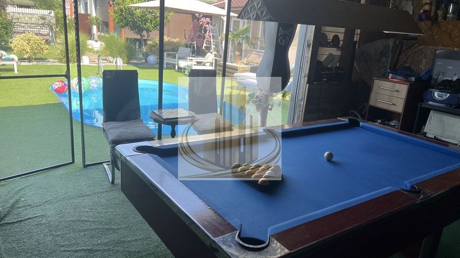 Casă de închiriat în Săcălaz – 199 mp, 4 camere, piscină și terasă - Poză 5