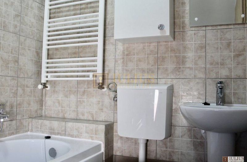 2 dormitoare, 80 mp utili, gradina si curte proprie de 300mp. - Poză 13