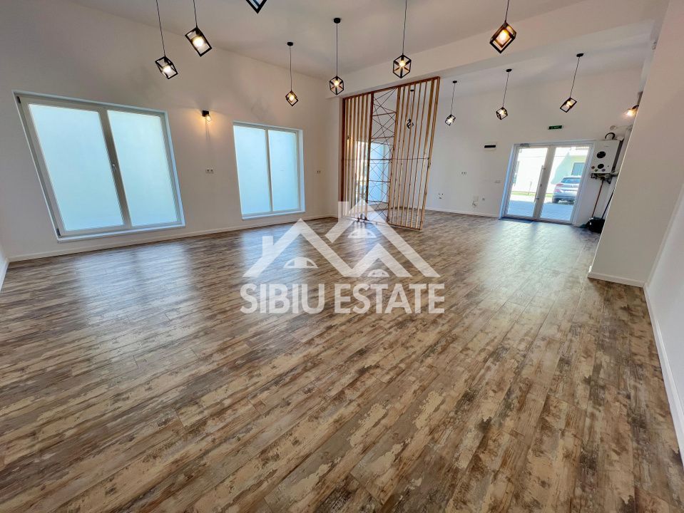 Spatiu Comercial Finisat 65 mp, curte proprie 78 mp, 2 parcari - Poză 2