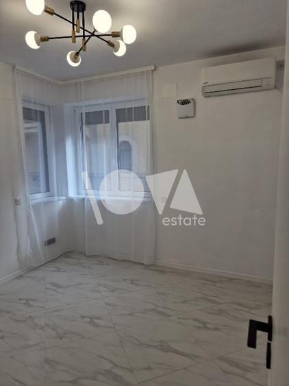 De închiriat Duplex 5 camere (parter + demisol) - vila Piata Romana - Poză 3