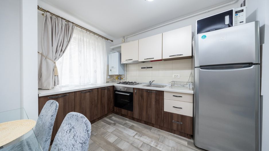 Apartament cu doua camere modern ,cu boxa in Top City - Poză 9