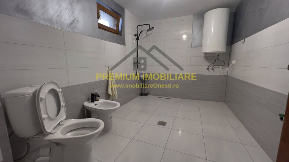 Casa de vanzare la 13 km de Onesti - Poză 23