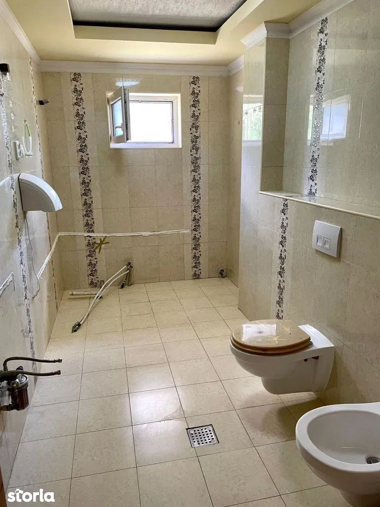 Ag. EUROPA vinde ap. 4 cam. in Carei, renovat, decomandat, la parter. - Poză 3