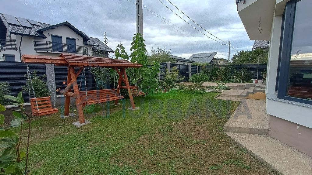 Casă de vânzare în Aroneanu, str. Busuiocului: 4 dormitoare, 3 băi, living open space, suprafață utilă 150 mp, teren 550 mp - Poză 3