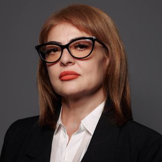 Cristiana Gheorghe - REOS Group