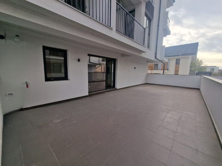 Apartament 2 camere Otopeni + terasă 30 mp | parcare subterană - Poză 1