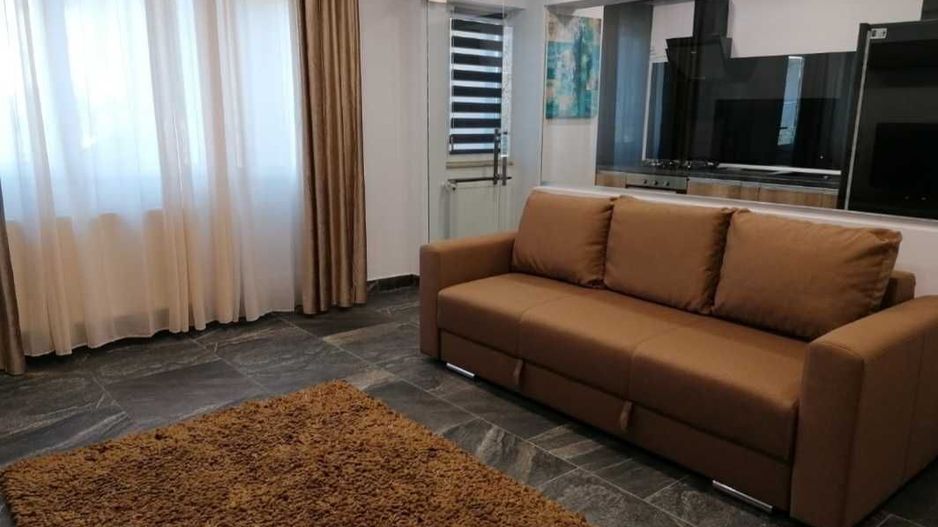 Apartament 2 camere cu parcare și centrală proprie - Poză 1