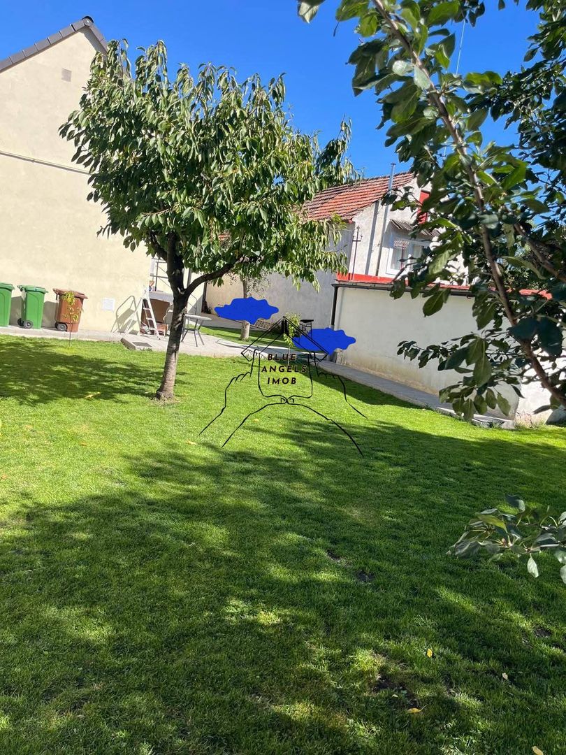 Casa recent renovata in zona centrala - cu loc de parcare si garaj - Poză 2