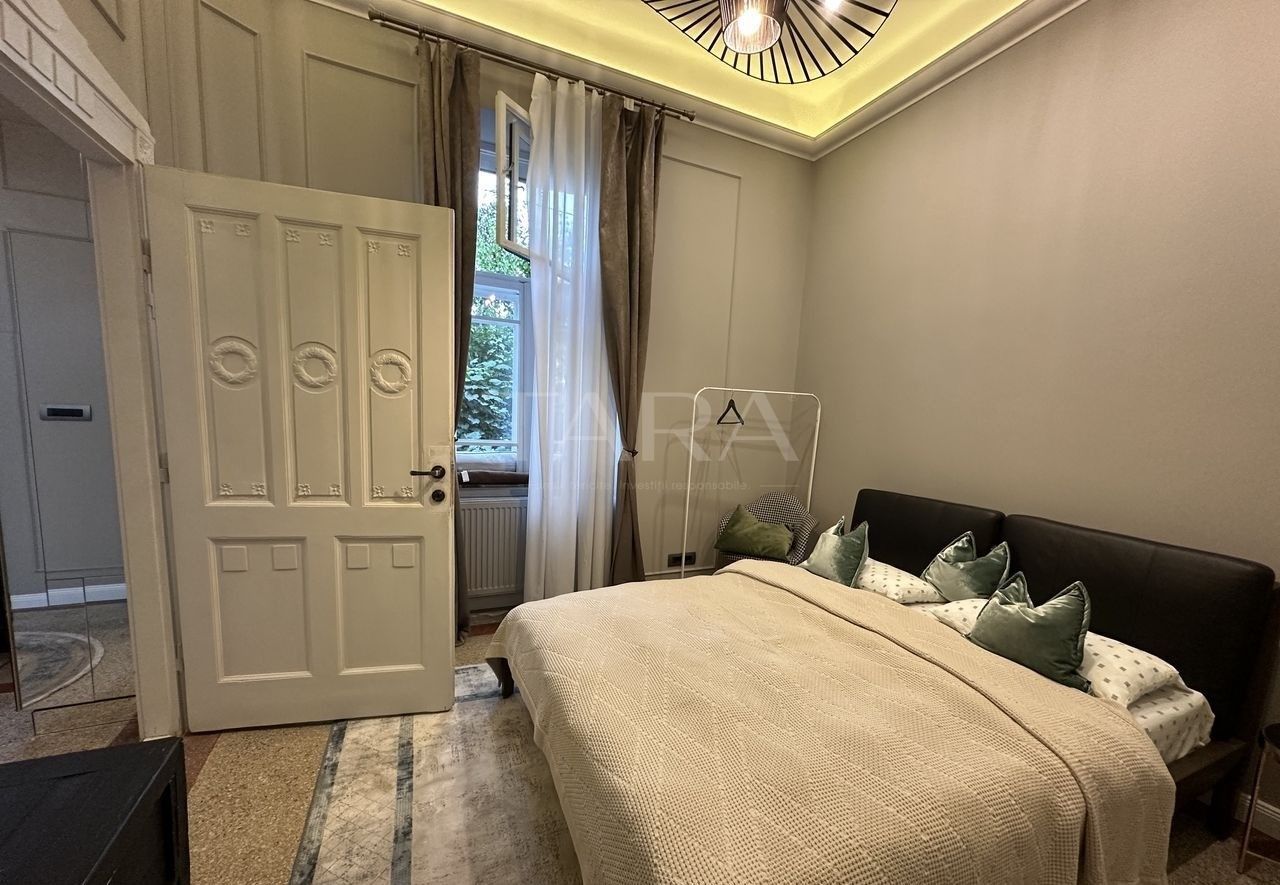 Eleganță, lumină și liniște – 3 camere în inima Clujului - Poză 11