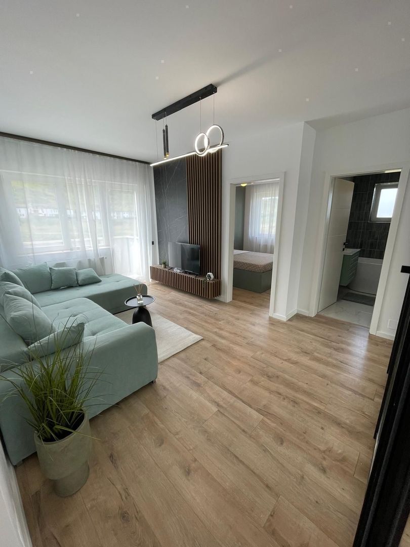 VANZARE APARTAMENT ULTRAFINISAT  2 CAMERE ZONA TERRA - Poză 2