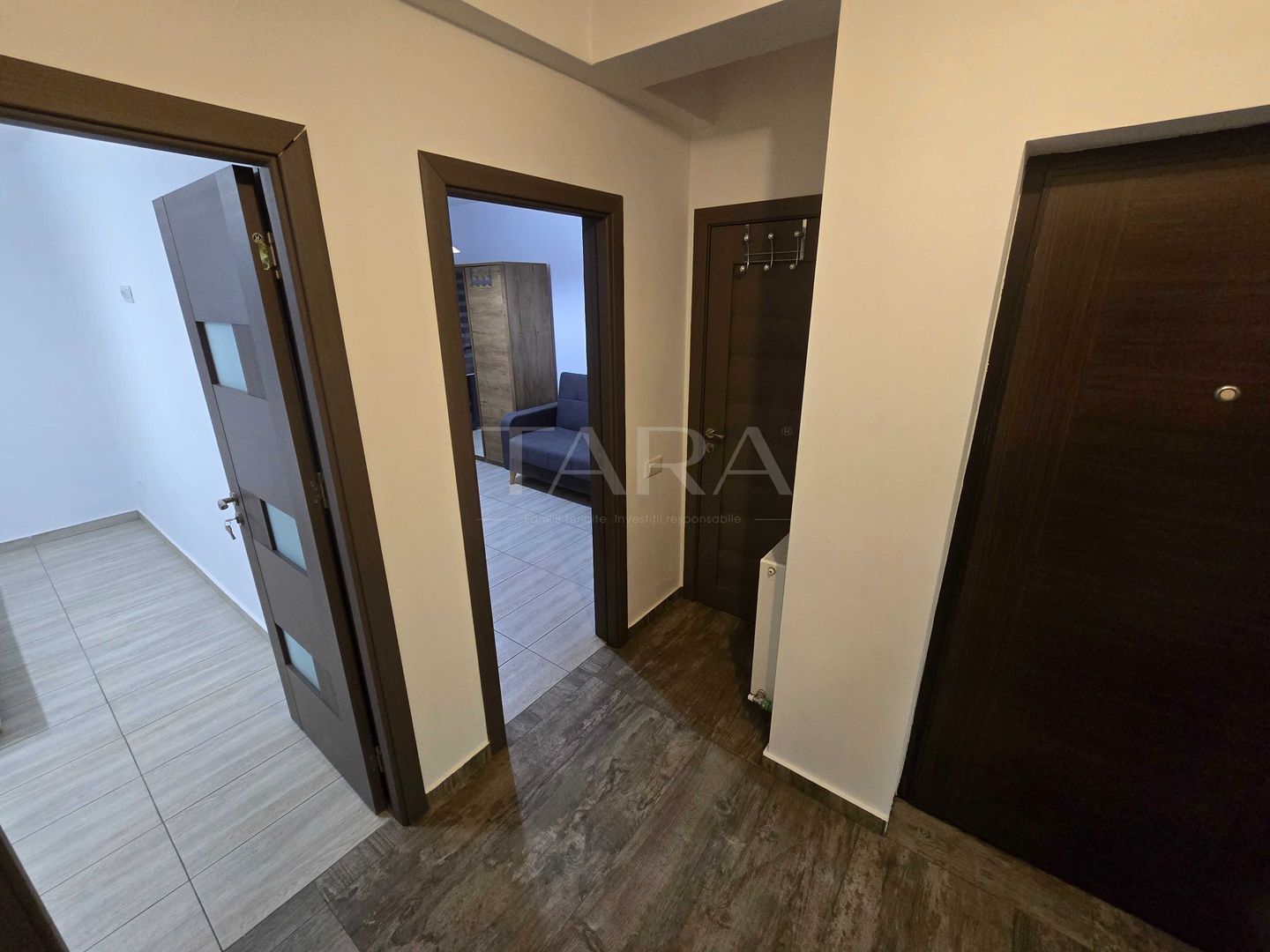 Apartament cu 3 camere si gradina, zona centrala a localitatii - Poză 5
