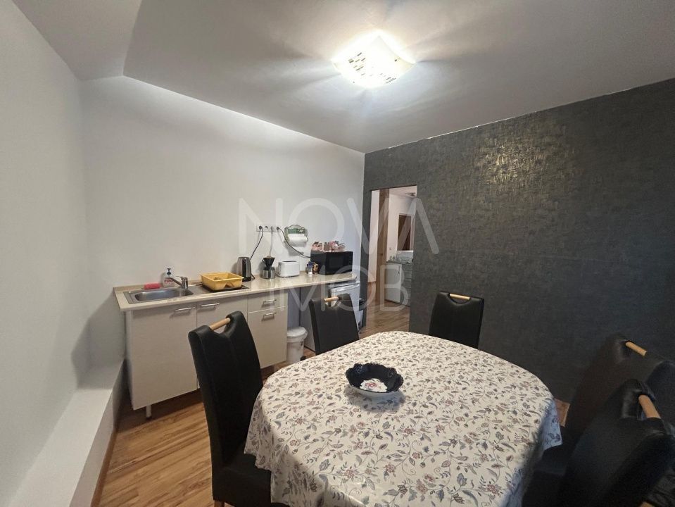 Casa de vanzare 200 mp cu spatiu comercial la parter, strada Lunga - Poză 2
