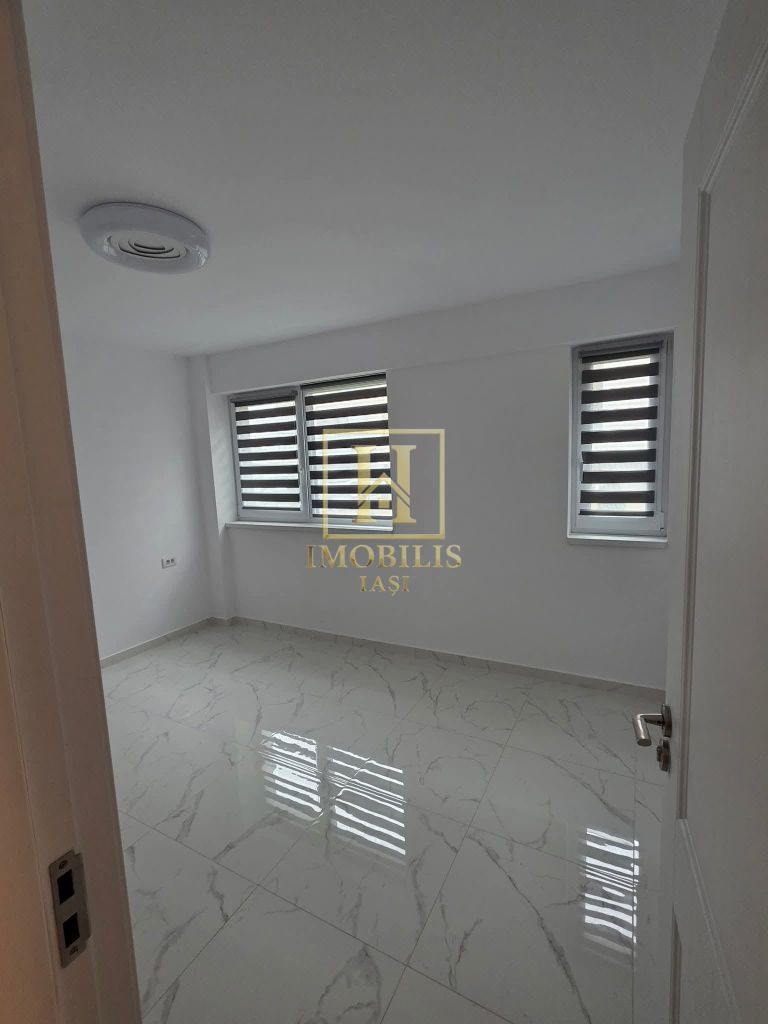 Apartament 2 camere 63mp + loc de parcare capat Pacurari 110000 euro - Poză 3
