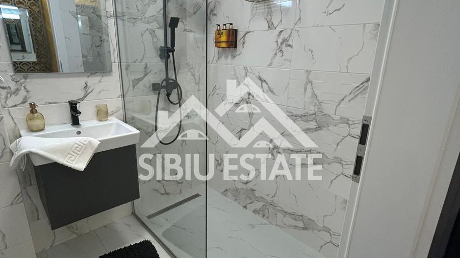 Apartament mobilat-utilat, cu 2 camere, balcon, parcare si boxa - Poză 3
