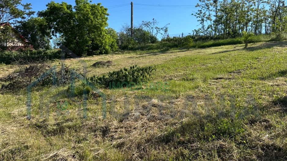 Teren intravilan Tiganasi, 1000 mp, deschidere 28 m la drum - Poză 1