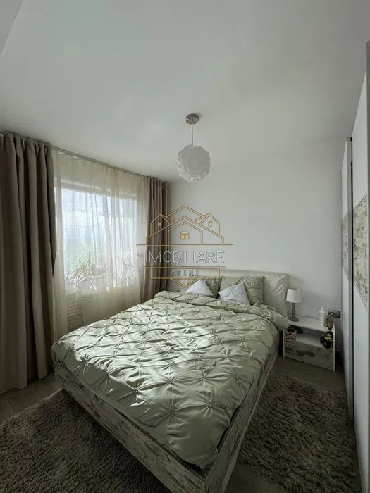Apartament într-o zonă liniștită cu balcon și parcare - Poză 1