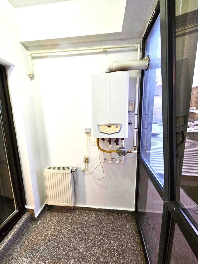 Închiriez garsonieră modernă  Piața Alba Iulia, centrală proprie - Poză 7