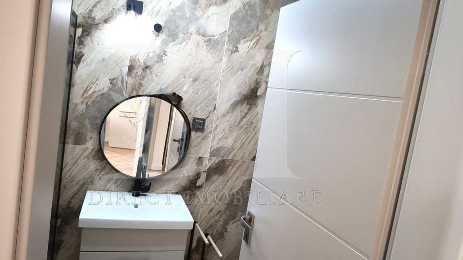 Apartament cu 2 camere -zona Eroilor Floresti - Poză 9