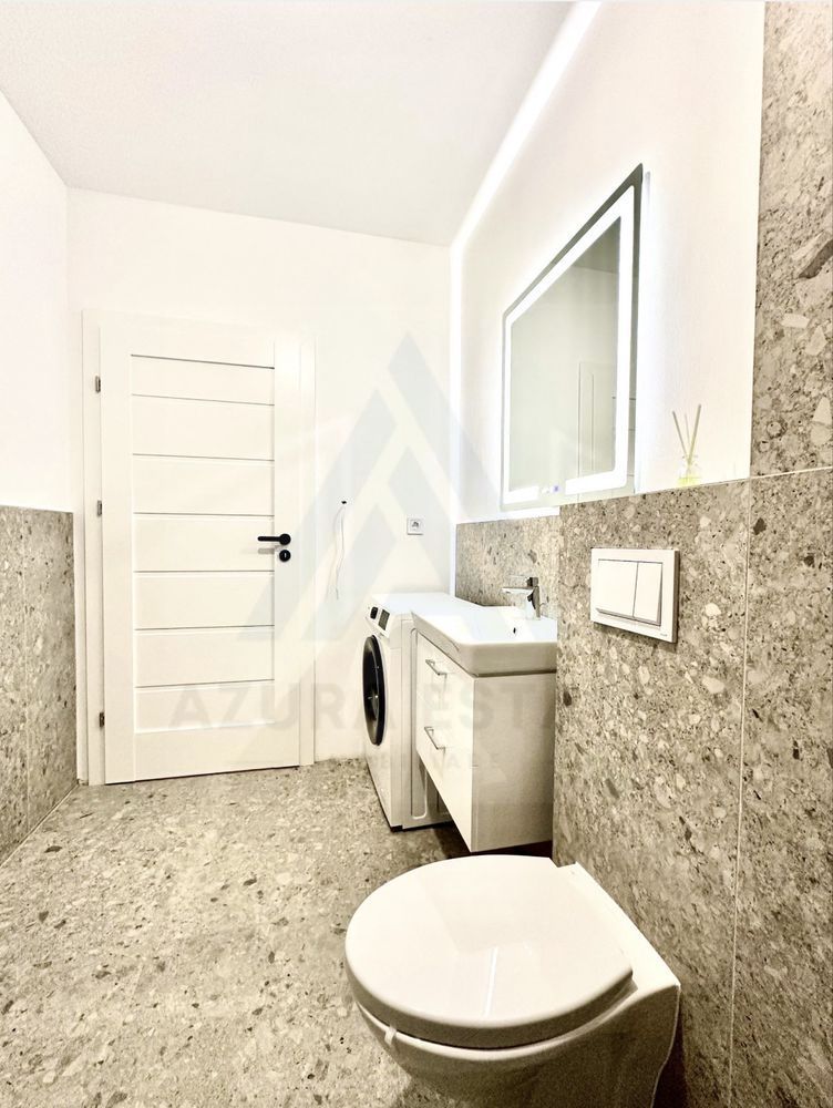 Apartament ultrafinisat 2 camere balcon 7.37 mp utili in Cristian - Poză 11