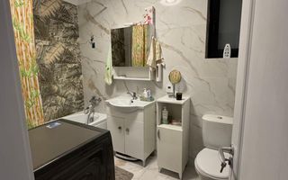 Vila modernă pe parter cu terasă închisă și pod pentru depozitare - Poză 8