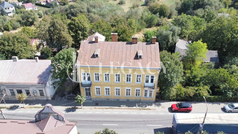 VÂNZARE/SCHIMB CU TEREN  - Clădire interbelică, centru oraș Siret - Poză 2