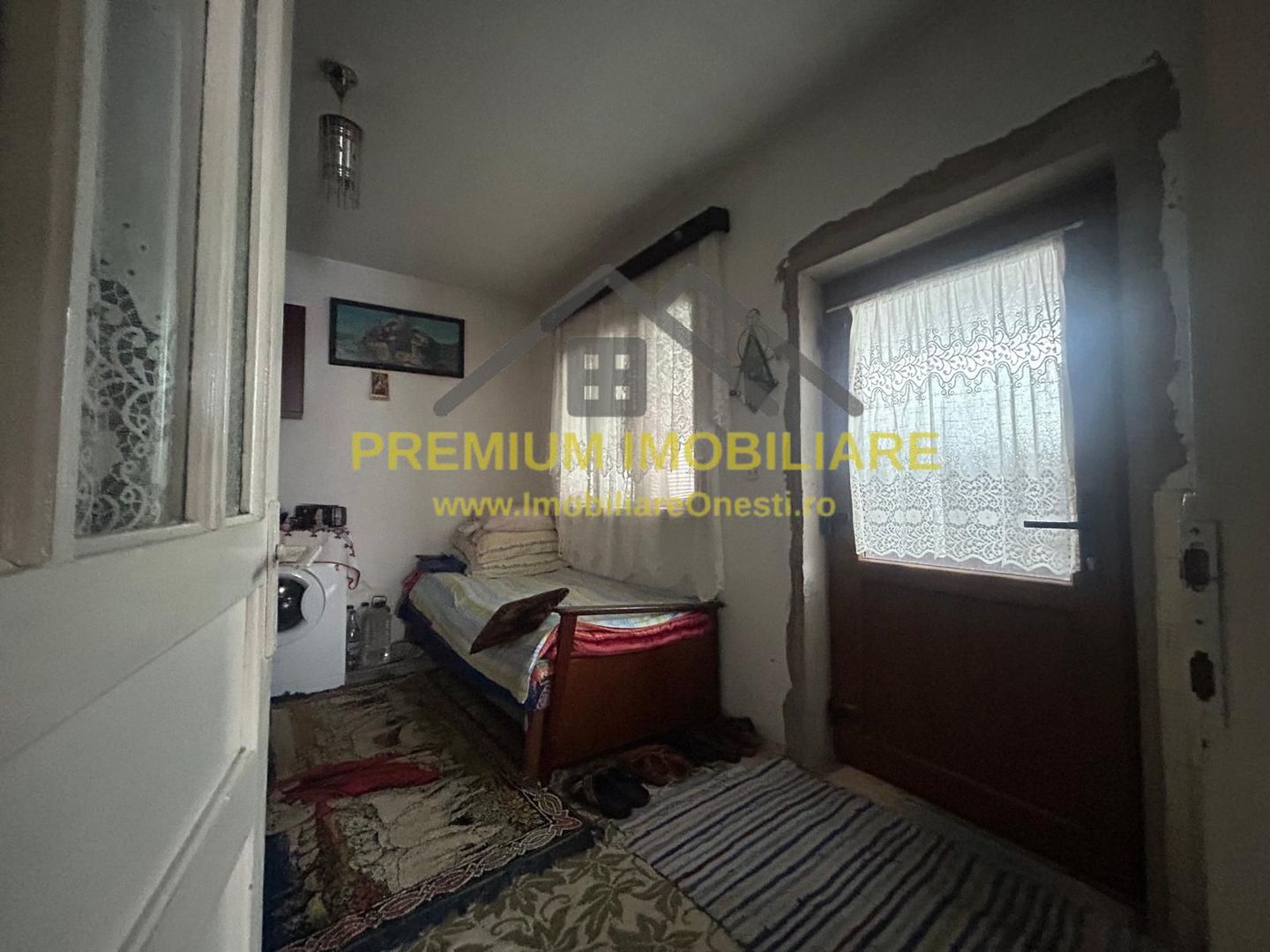 Casă batraneasca+ teren 999 mp intravilan în Oituz - Poză 8