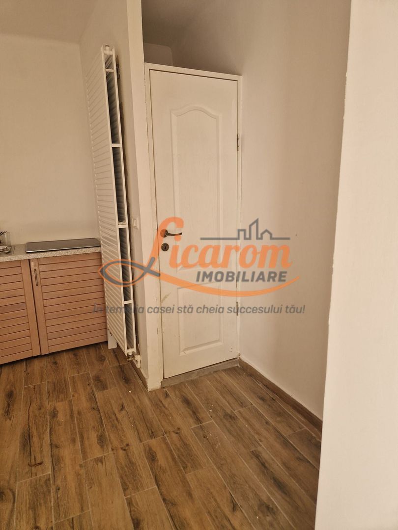 Garsoniera in casa str Iuliu Maniu curte comuna. - Poză 6