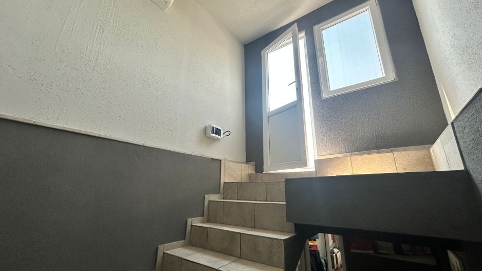 Casă P+1E cu terasă circulabilă, garaj amenajat și finisaje moderne - Poză 21