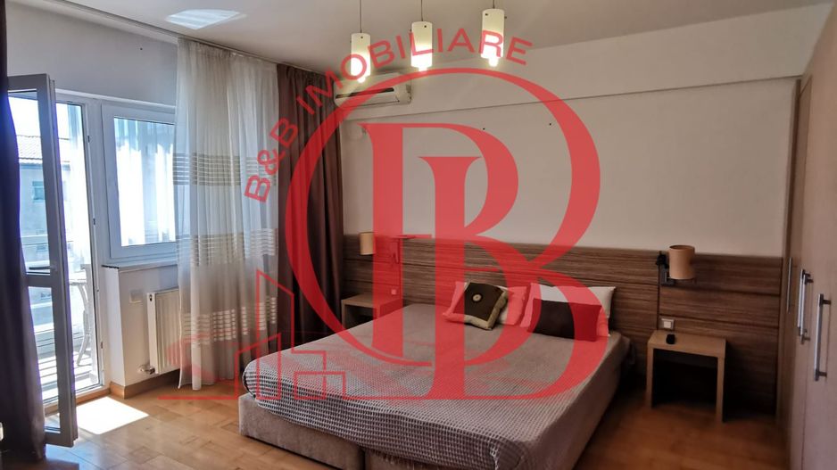 Garsoniera spatioasa mobilata si utilata - Poză 10