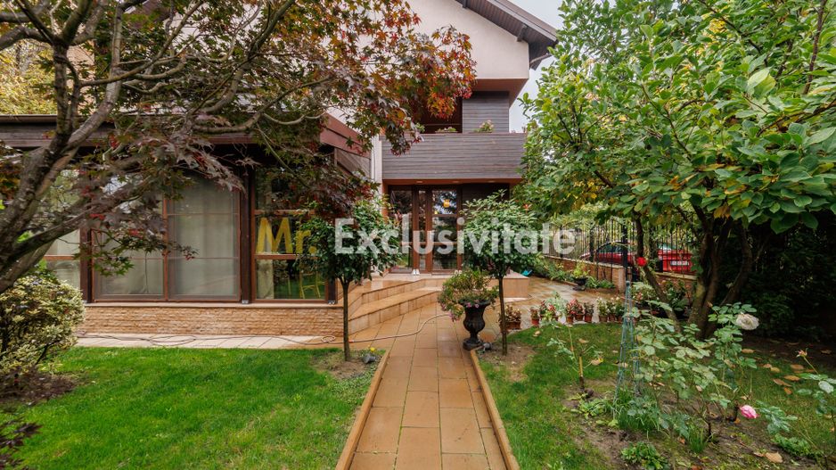 Eleganță și confort pe 500 mp de teren - Vilă în Ștefănești - Poză 2