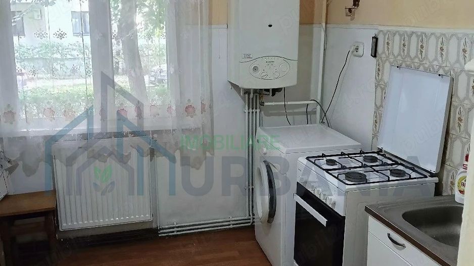Apartament cu 2 camere decomandate în Nicolina 2, parter - Poză 1