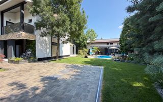 Casa P+1+M cu teren de 650 mp, piscina si curte complet amenajata - Poză 3