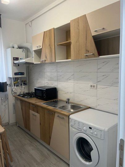 Garsoniera demisol foarte inalt centrala 26 mp - Poză 5