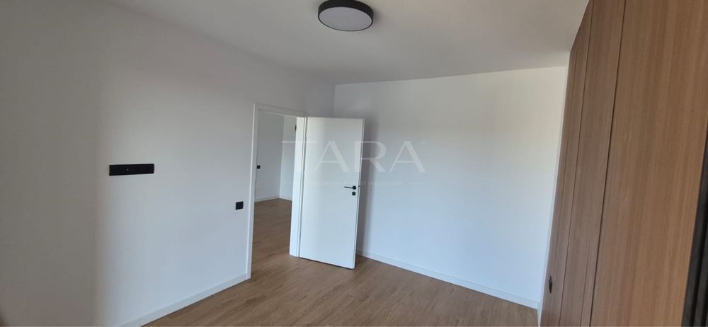 Apartament modern cu 2 camere, 54 mp + 4 mp, parcare subterană. - Poză 3