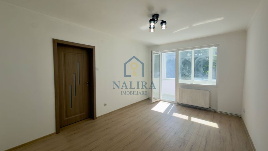 Apartament cu 3 camere et 1 + garaj - Poză 1