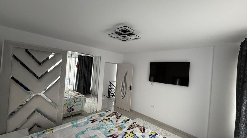 Casă modernă de vânzare în Vânători – 110 mp utili, teren 259 mp, complet mobila - Poză 6