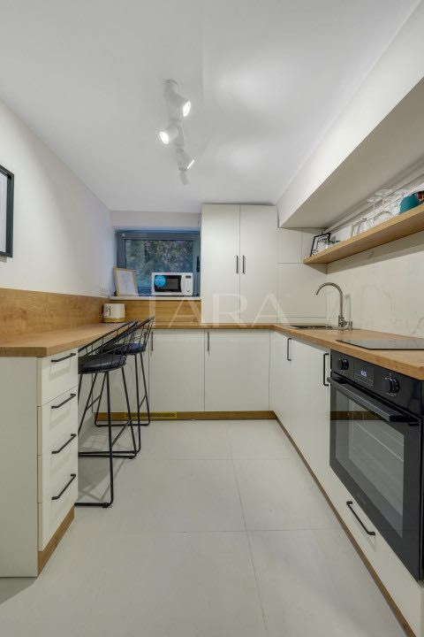 Garsonieră renovată integral, ideală pentru investiție sau regim hotel - Poză 5